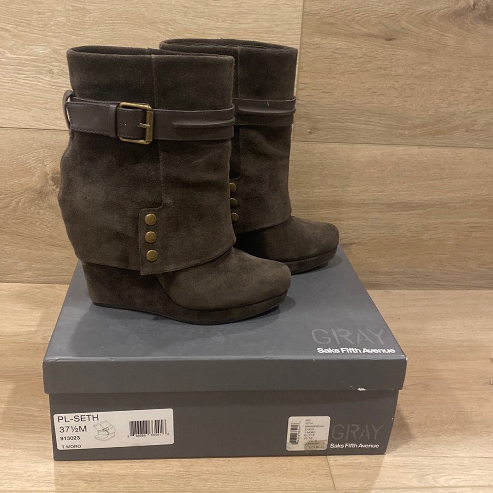 Brown suede wedge booties.